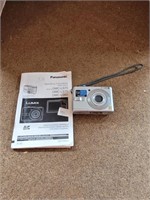 Panasonic Lumix Digital Camera with paperwork