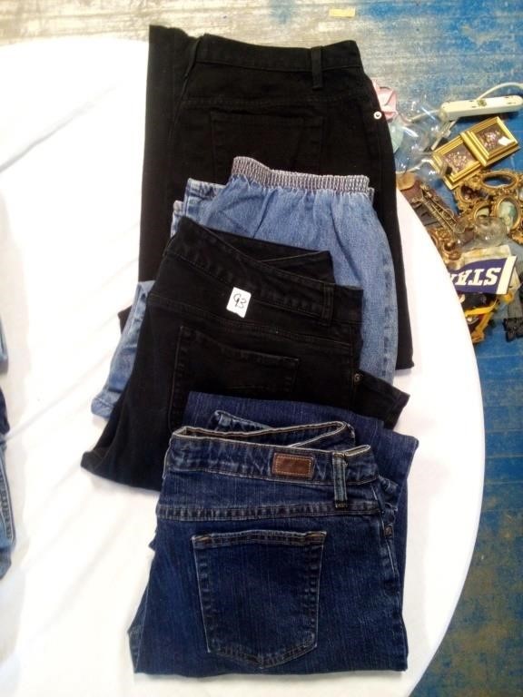 4 pairs of blue and black jeans size 12/14