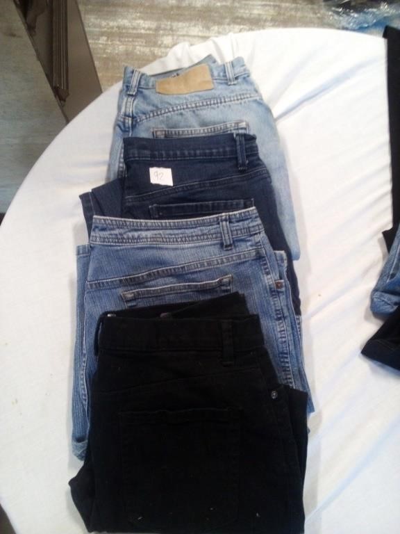 4 pair of blue/black jeans size 12/14 petite
