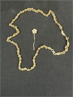 Chain is marked 14 karat diamond indicator stick