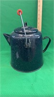 Ant enamel coffee pot has a small hole in the