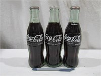 3 Unmarked Coca Cola Bottles