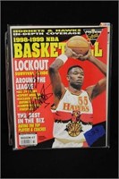 Dikembe Mutombo autographed basketball magazine