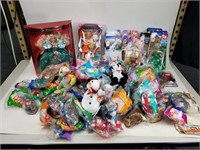 Huge lot of beanie babys and 2 barbies