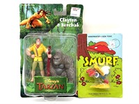 Vintage Smurf Figure and Disney’s Tarzan Clayton