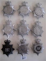 Nine UK Police Bobby helmet plates