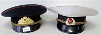 Two Russian/East German police hats