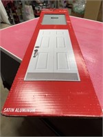 Satin aluminum kickplate protects door surface