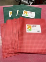 14 two pocket folders, red and green