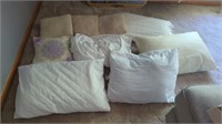 4 SMALL DECORATIVE PILLOWS AND 5 BED PILLOWS
