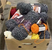 Box of new and used yarn and fabrics