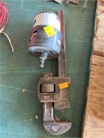 Pipe wrench and hole saw