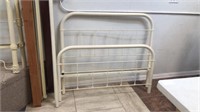 Antique iron bed with rails