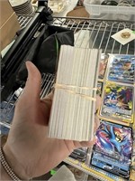 THICK STACK OF POKEMON CARDS