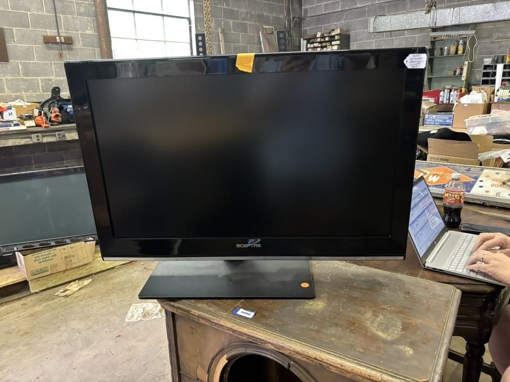 32inch sceptre tv with stand cord, and 2 remotes