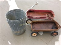 Old wagons and metal trash can