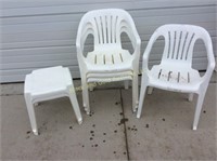 Plastic lawn chairs and footstools