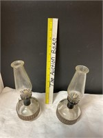 Two small oil lamps