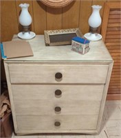 Small chest of drawers and contents