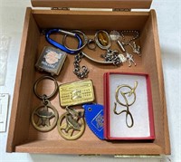 Cigar Box with Key Chains and Golden Coloroed Pin