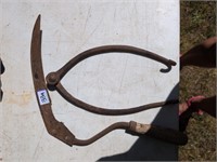 Hand sickle and antique pot lifter