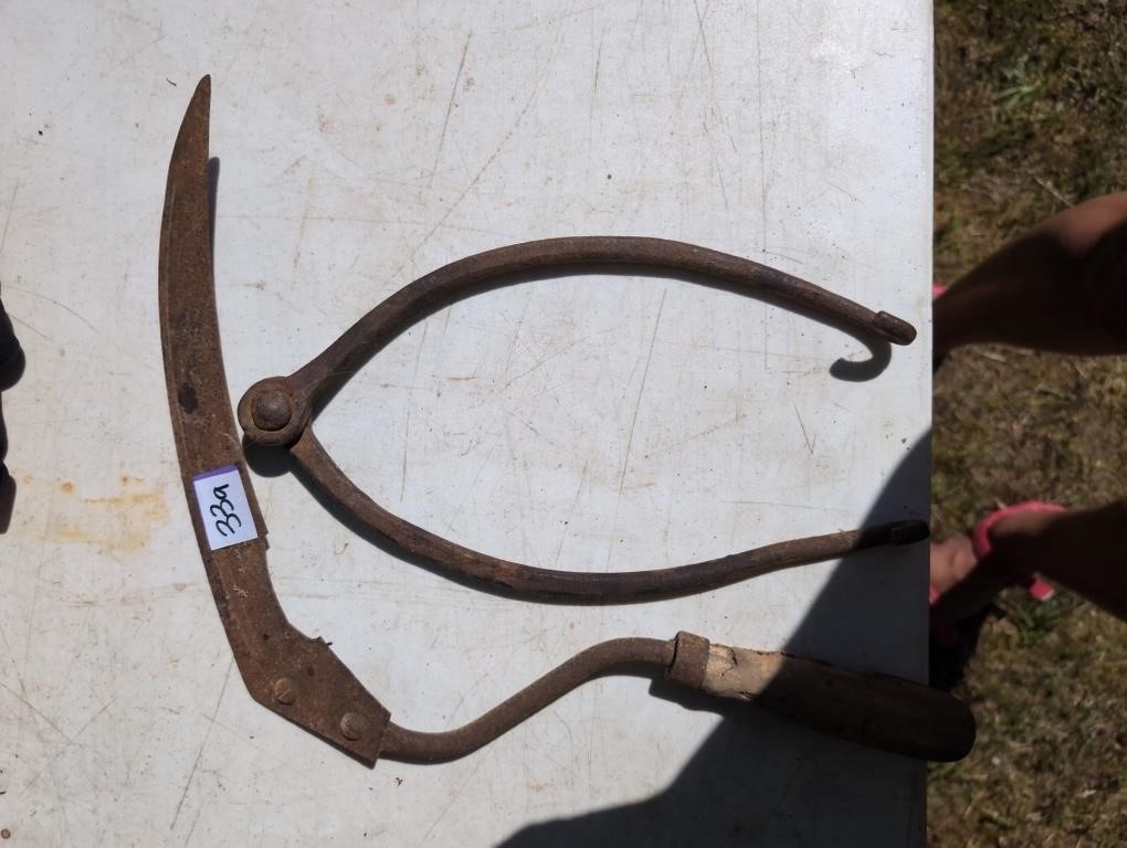 Hand sickle and antique pot lifter