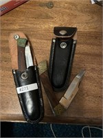 2 Pocket knives in leather cases