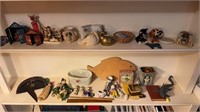 Two shelves of miscellaneous toys & animal