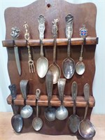 Antique spoon collection on board