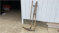 Two scythes and pitch fork