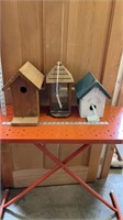 2 wooden bird houses and feeder