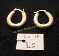 14K gold earrings, weighs .075 ozt