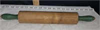 old rolling pin with green handles