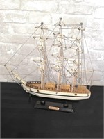 " Constitution " replica wooden ship with stand.