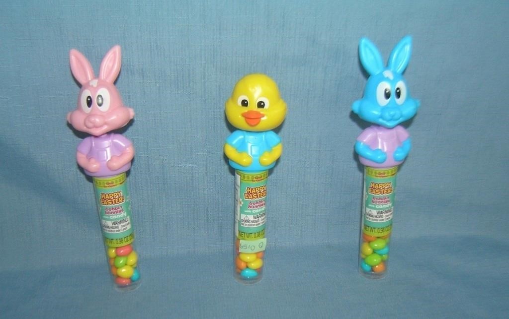 Group of 3 figural nodders/bobble heads candy cont