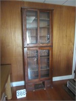 Tall Oak Cabinet with Sliding Doors
