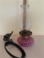 Cranberry swirl oil lamp with wall bracket