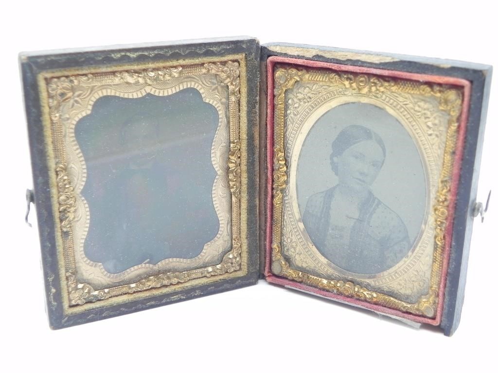DAGUERREOTYPES OF A MAN & WOMAN IN ORNATE FRAME