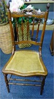 37"H Caned Chair with Owl Motif Carved in Back