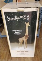 Lighted holiday giraffe by Sears and roebuck co