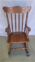 Child's wooden rocker. Seat is 12ins