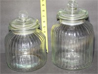 two ribbed glass storage jars w sealing lids