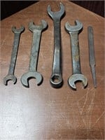 FOUR VINTAGE WRENCHES & FILE - LOT 1
