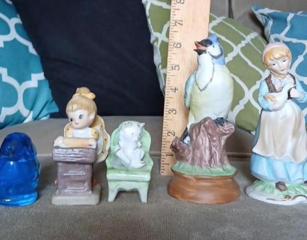 Blue bird of happiness and vintage figurines