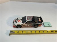 Ground Pecan Shells Western Auto Race Car