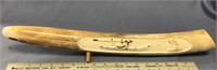 21" fossilized walrus tusk with relief carving of