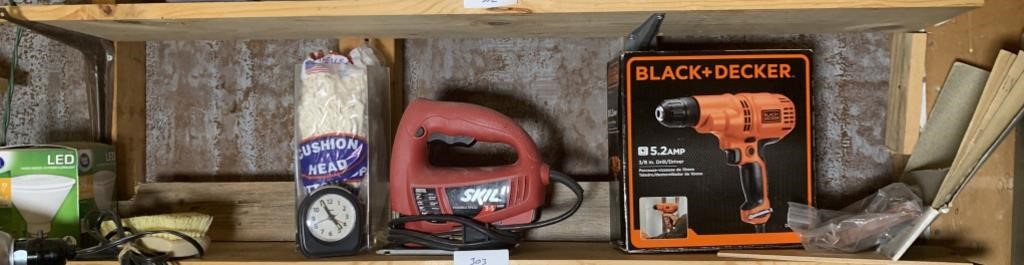 Shelf with Skill Saw and Black and Decker Drill