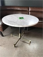 West End marble top round restaurant table