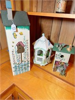 3 wooden bird houses