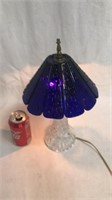 Crystal lamp with a cobalt glass shade